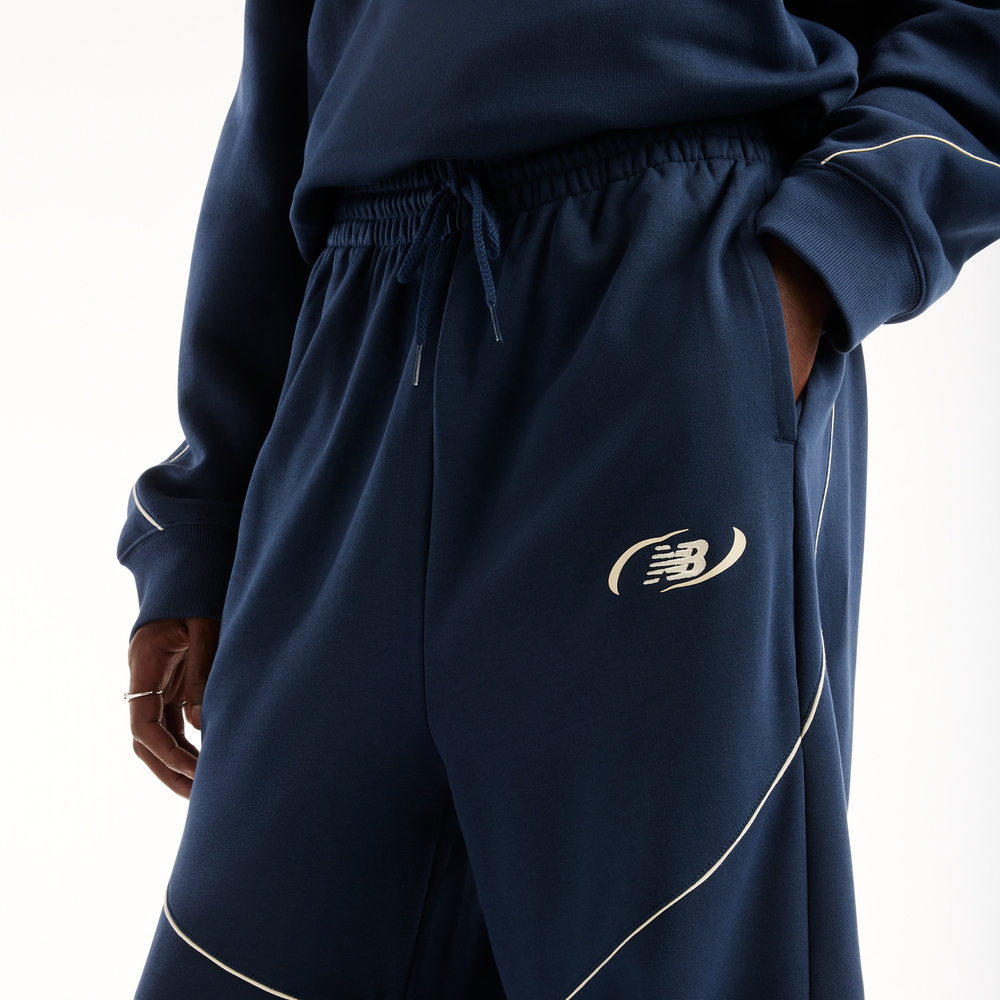 Pánské kalhoty New Balance Trackside Pants – tmavomodrá