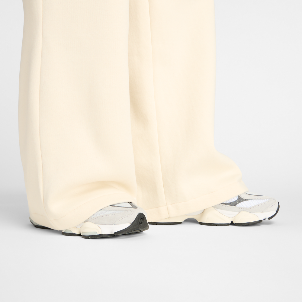 Dámské kalhoty New Balance WP53903LIN – béžové