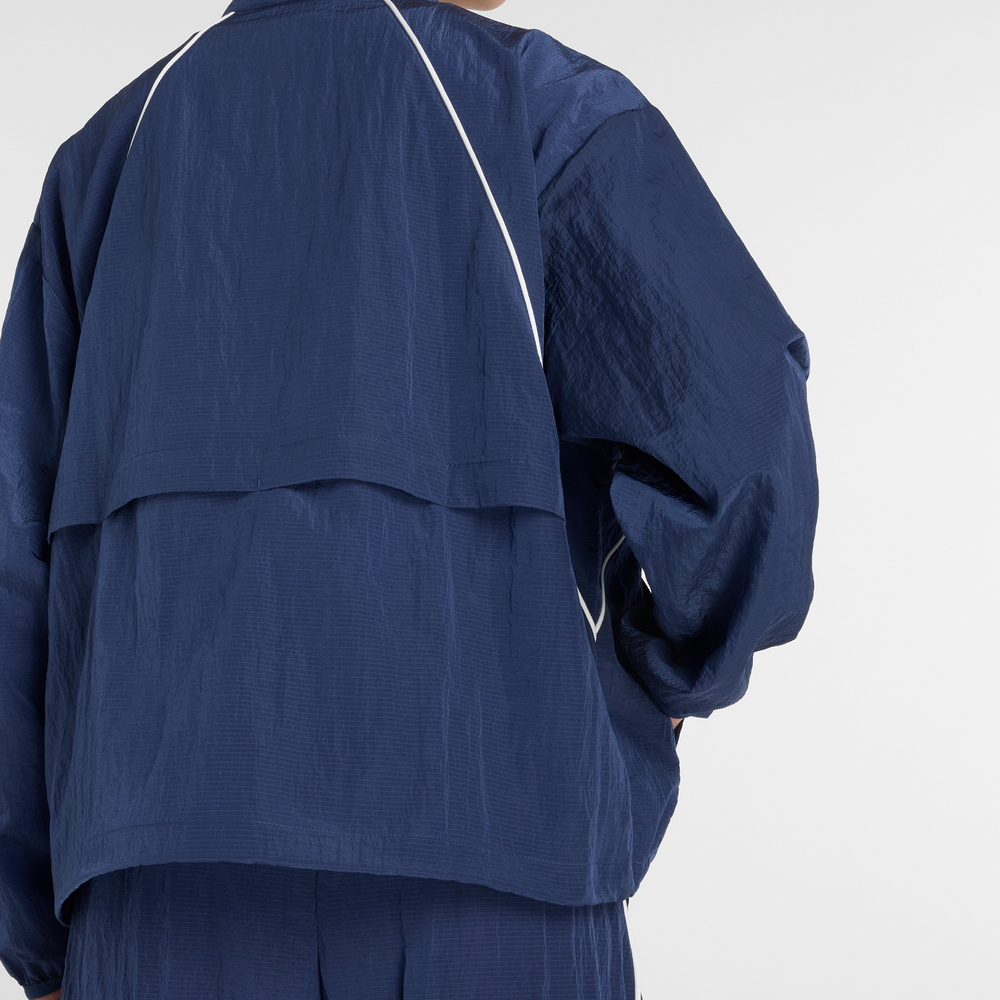 Dámská bunda New Balance WJ6113KSNNY – tmavomodrá