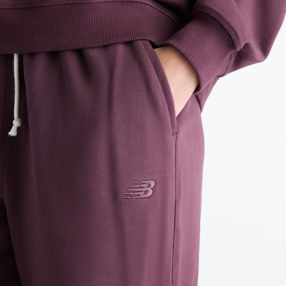 Dámské kalhoty New Balance Athletics – fialové
