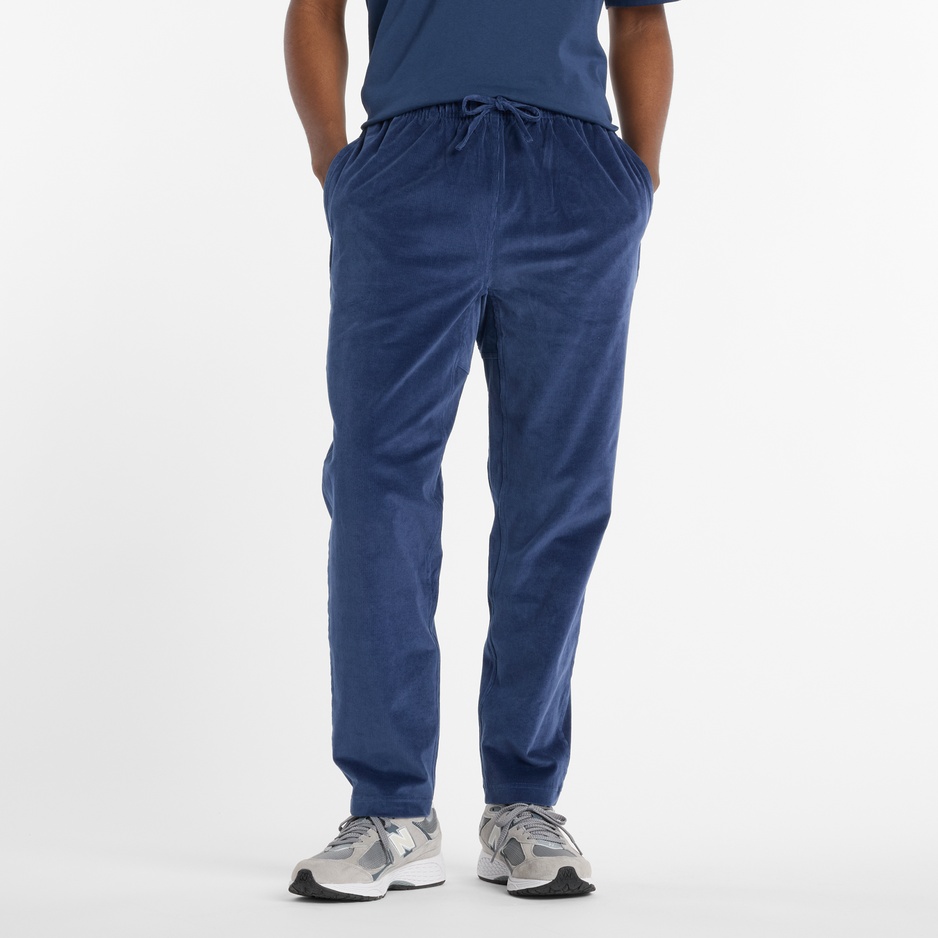 Pánské kalhoty New Balance MP53521NNY – tmavomodrá