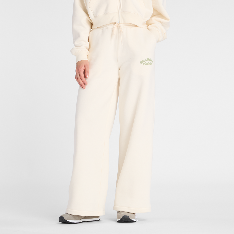 Dámské kalhoty New Balance WP53902PEF – béžové