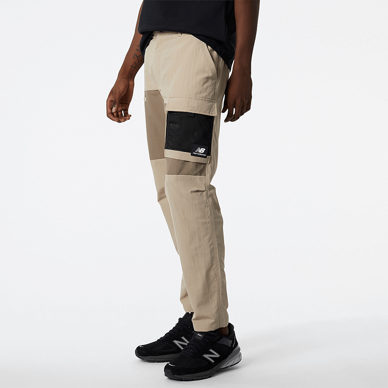 

Kalhoty New Balance MP21502MDY – béžové