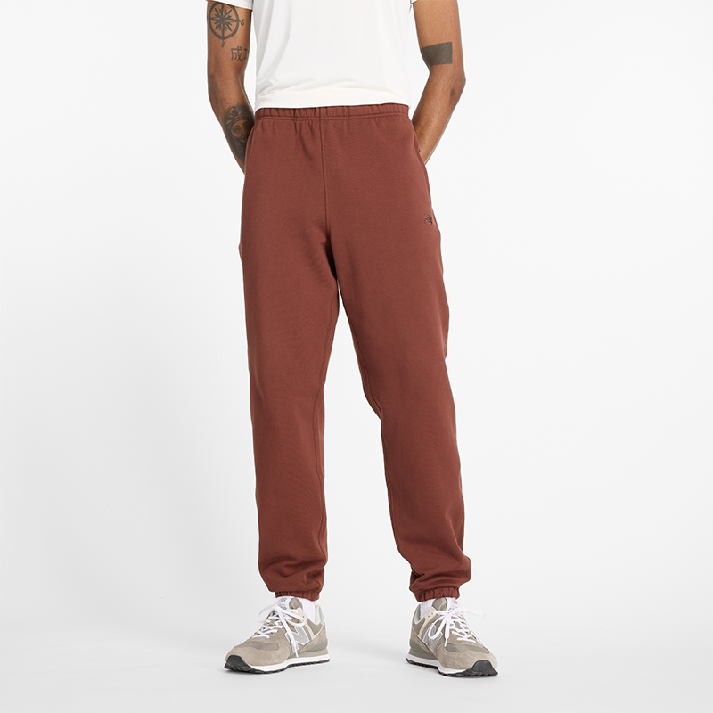 

Pánské kalhoty New Balance MP41508ROK – hnědý