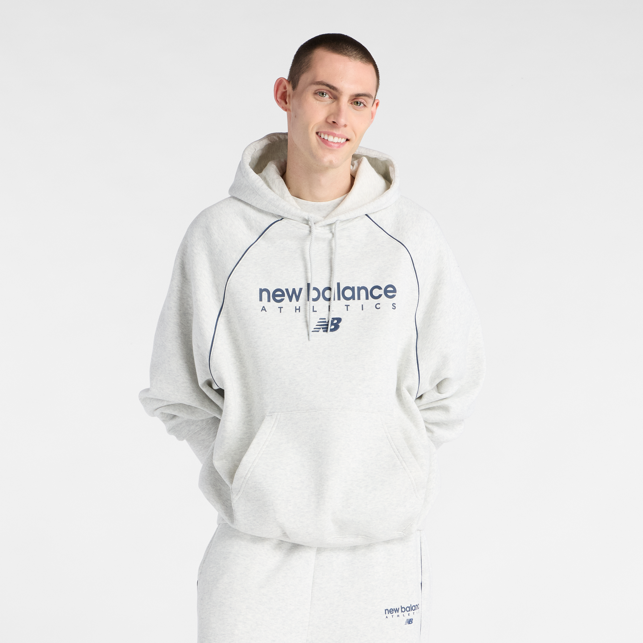 

Pánská mikina New Balance MT611629AHH – šedé