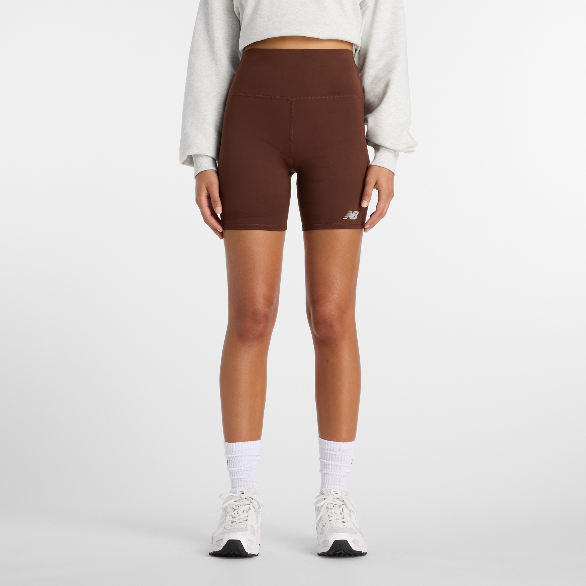 

Dámské legíny New Balance WS51114ABJ – hnědý