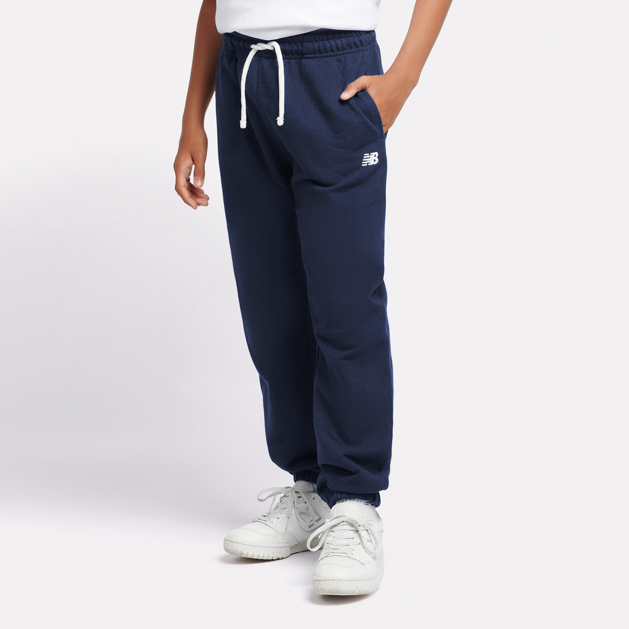 

Dětské kalhoty New Balance LAKB0060NNY – tmavomodrá