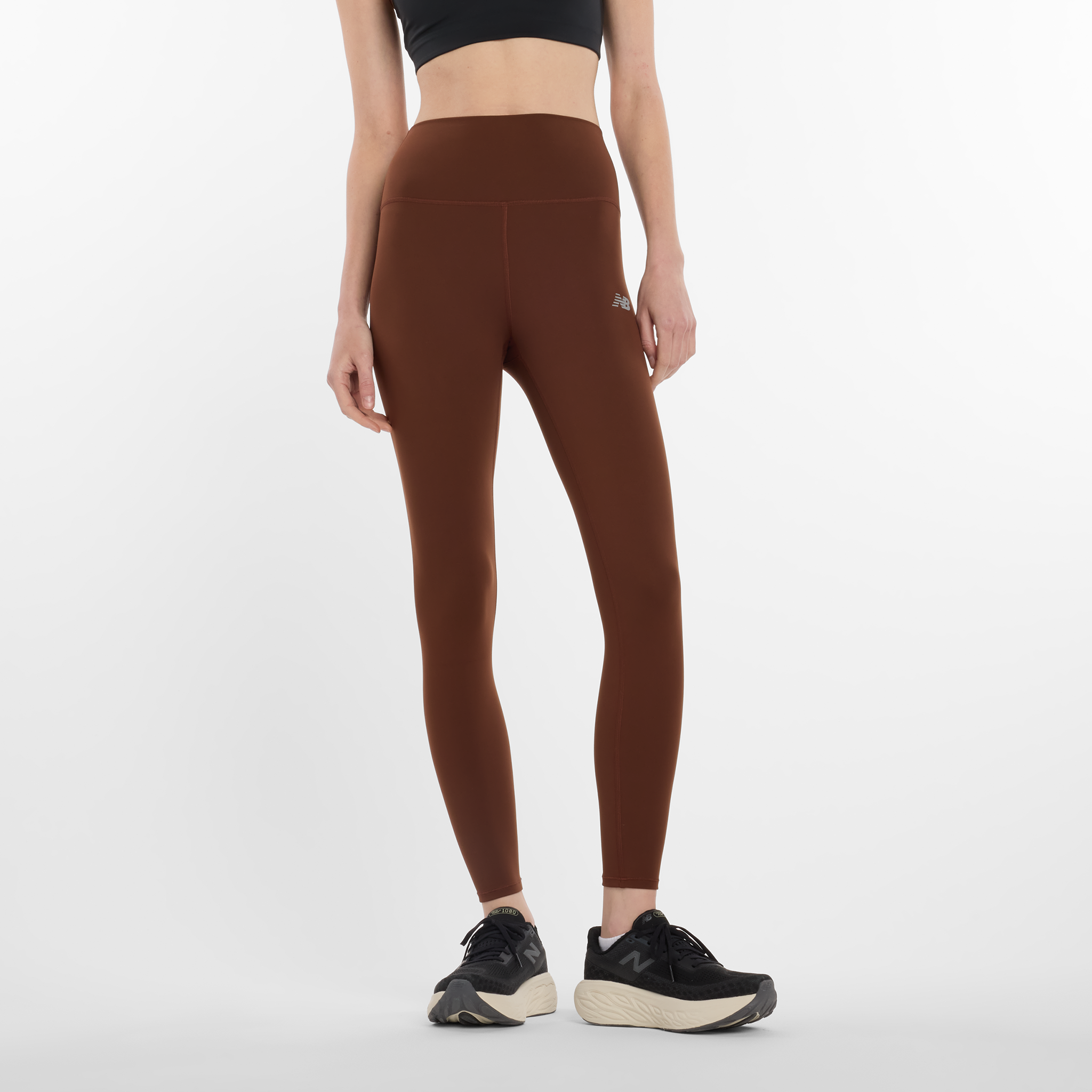 

Dámské legíny New Balance WP51112ROK – hnědý