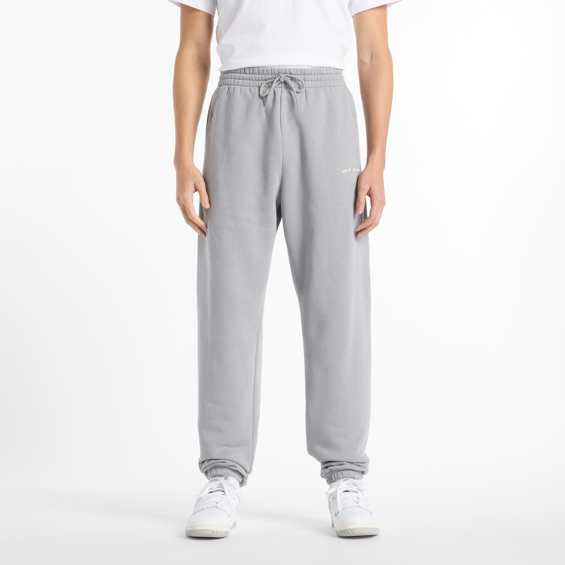 

Pánské kalhoty New Balance MP51505YST – šedé