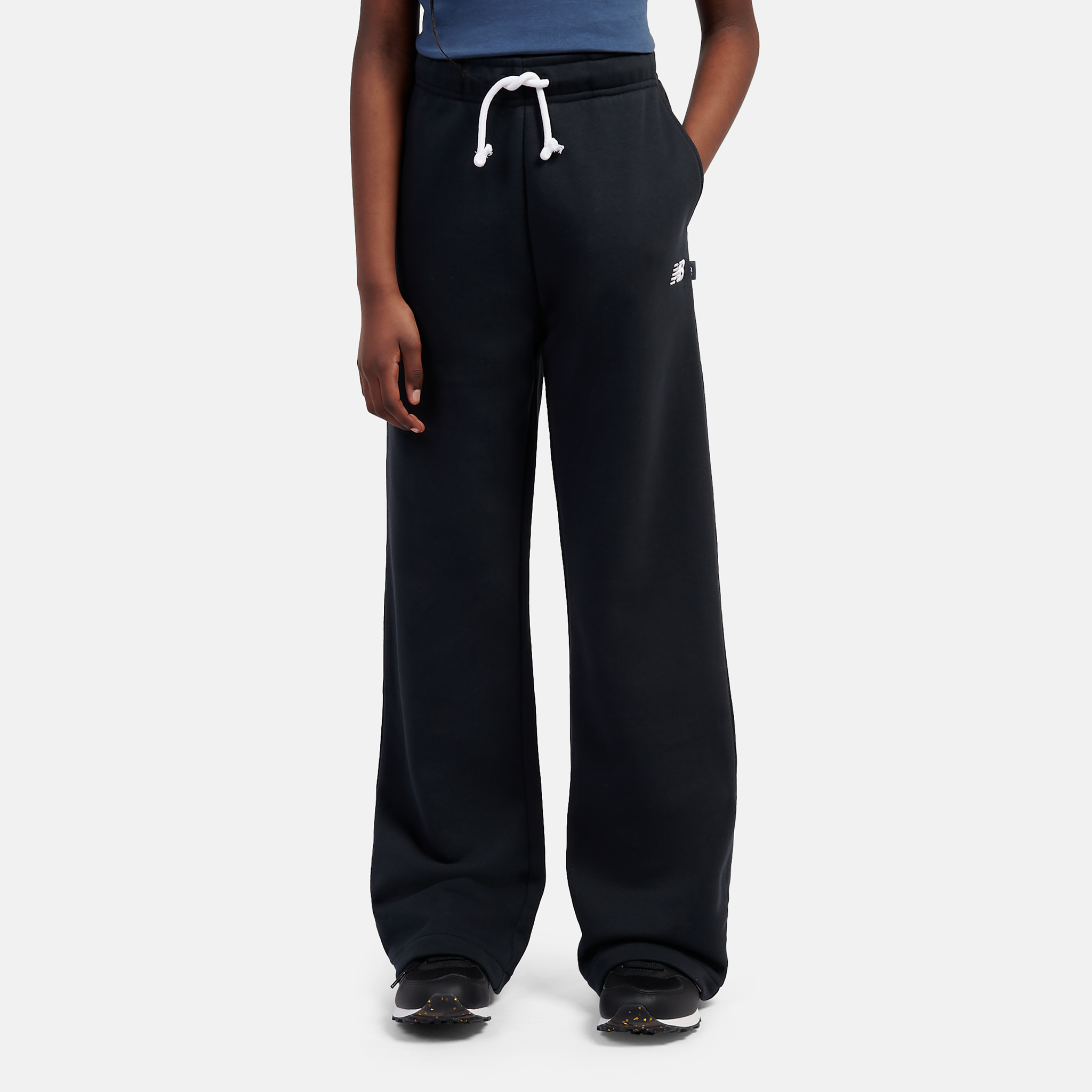 

Dětské kalhoty New Balance LAKG0216BK – černé