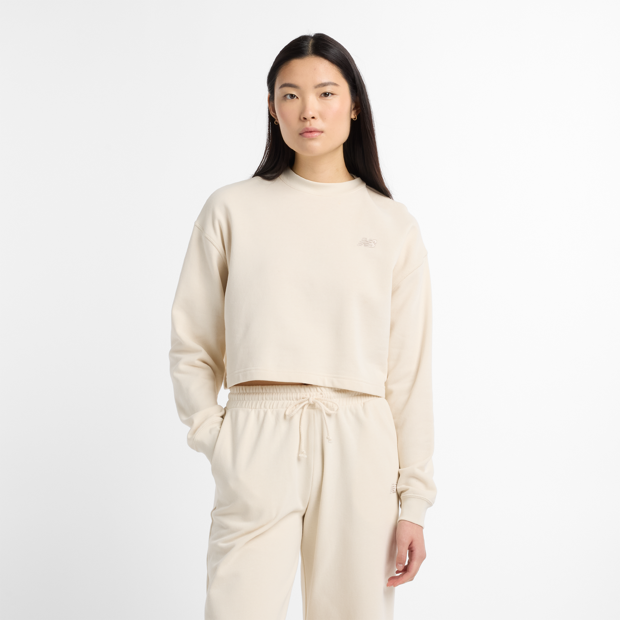 

Dámská mikina New Balance WT51514LIN – béžové