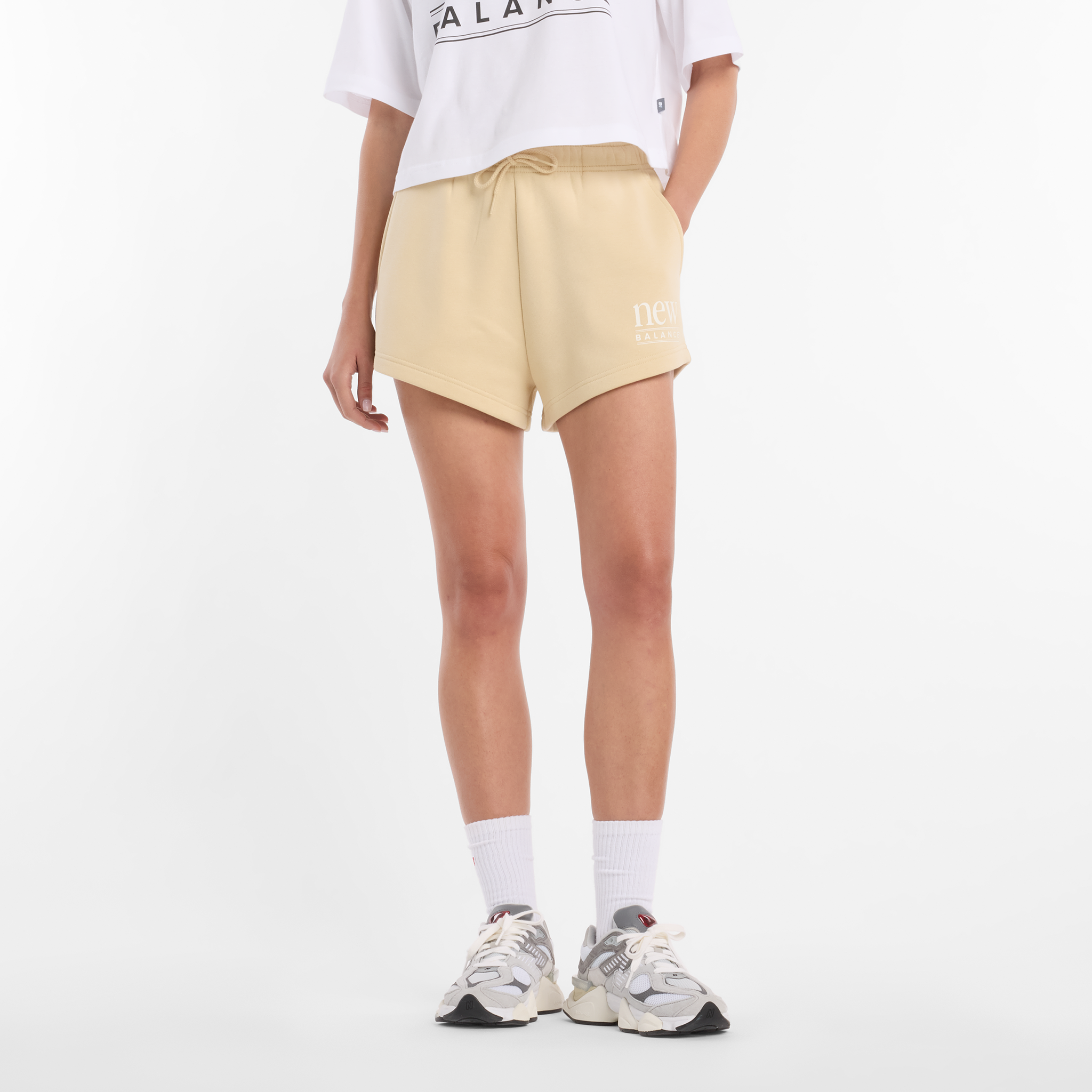 

Dámské šortky New Balance WB61Y80AABC – žluté