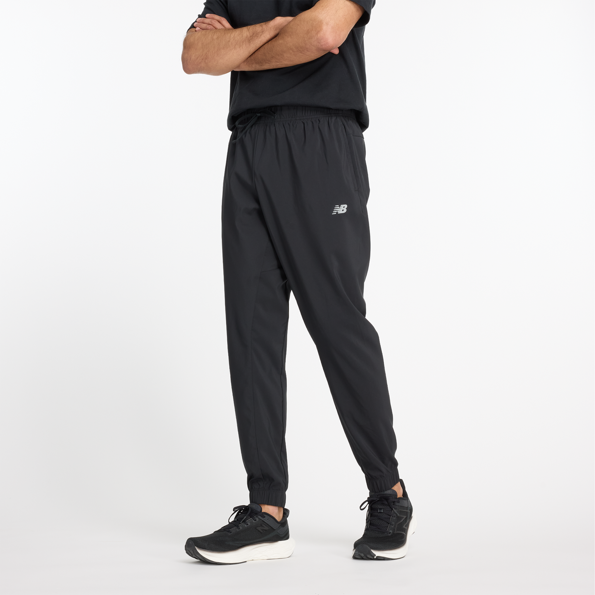 

Pánské kalhoty New Balance MP41011BK – černé
