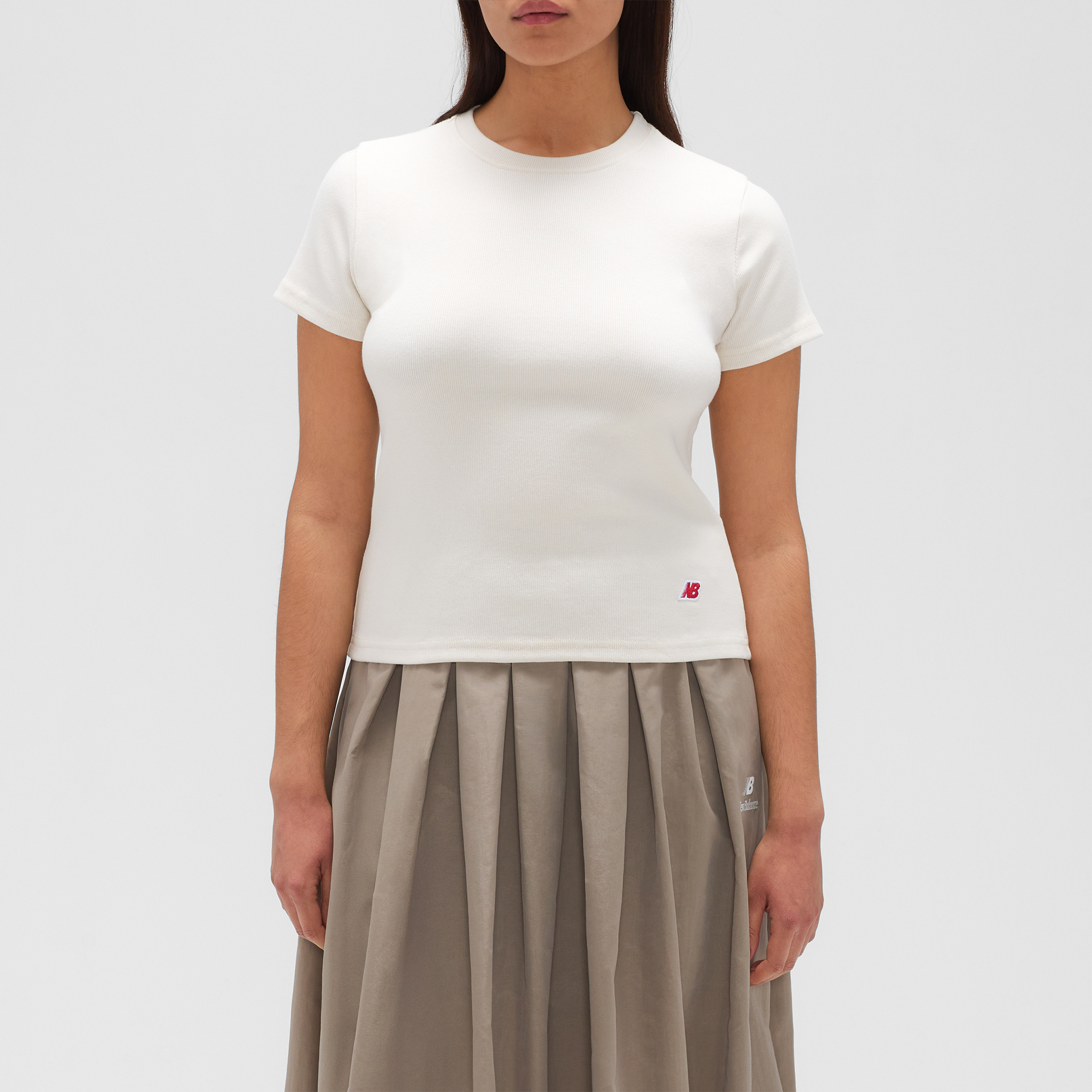 

Dámské tričko New Balance MADE in USA WT53561LIN – béžové