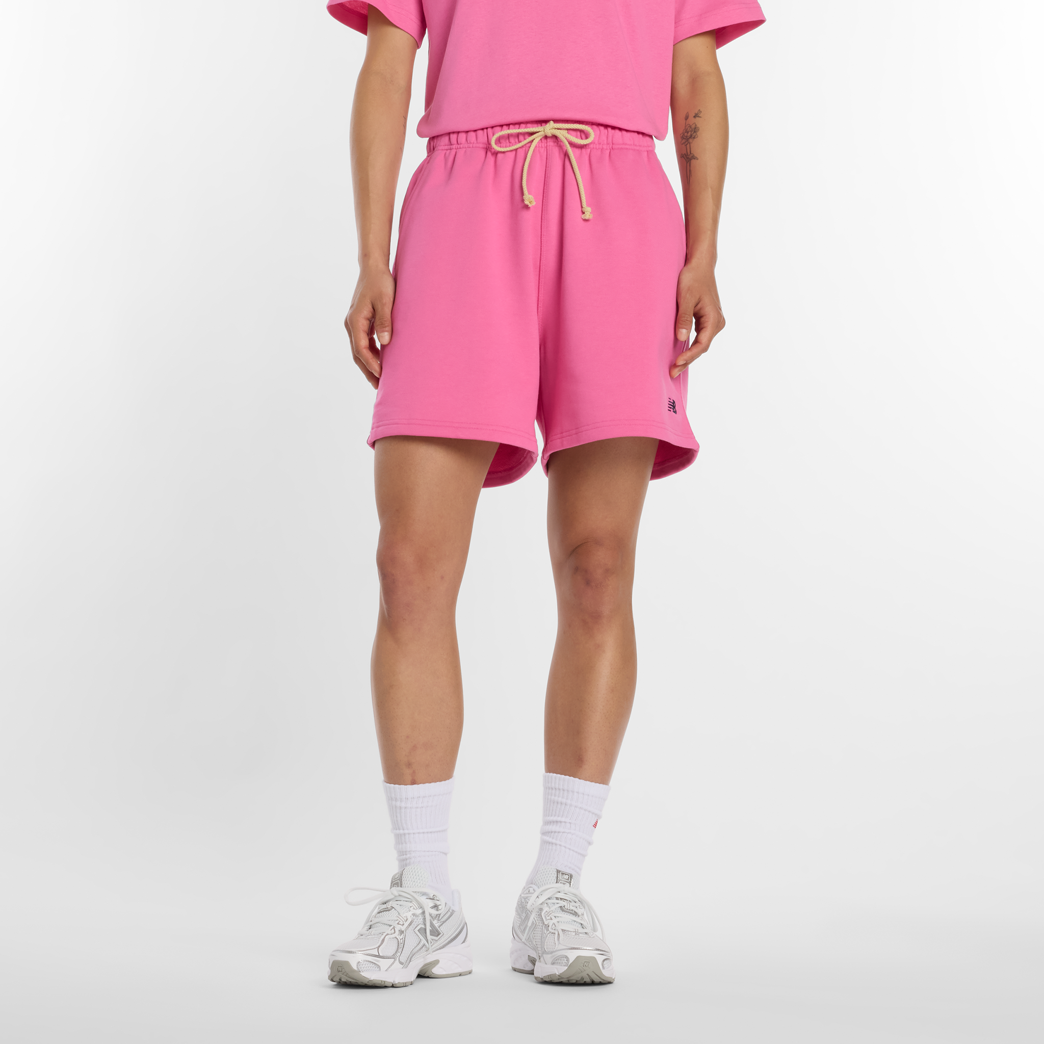 

Dámské šortky New Balance WS41508AAC – růžové