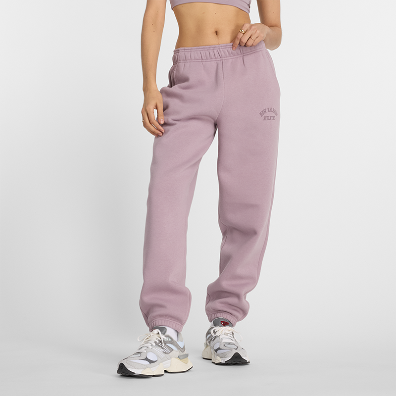 

Dámské kalhoty New Balance WP43500ICW – růžové