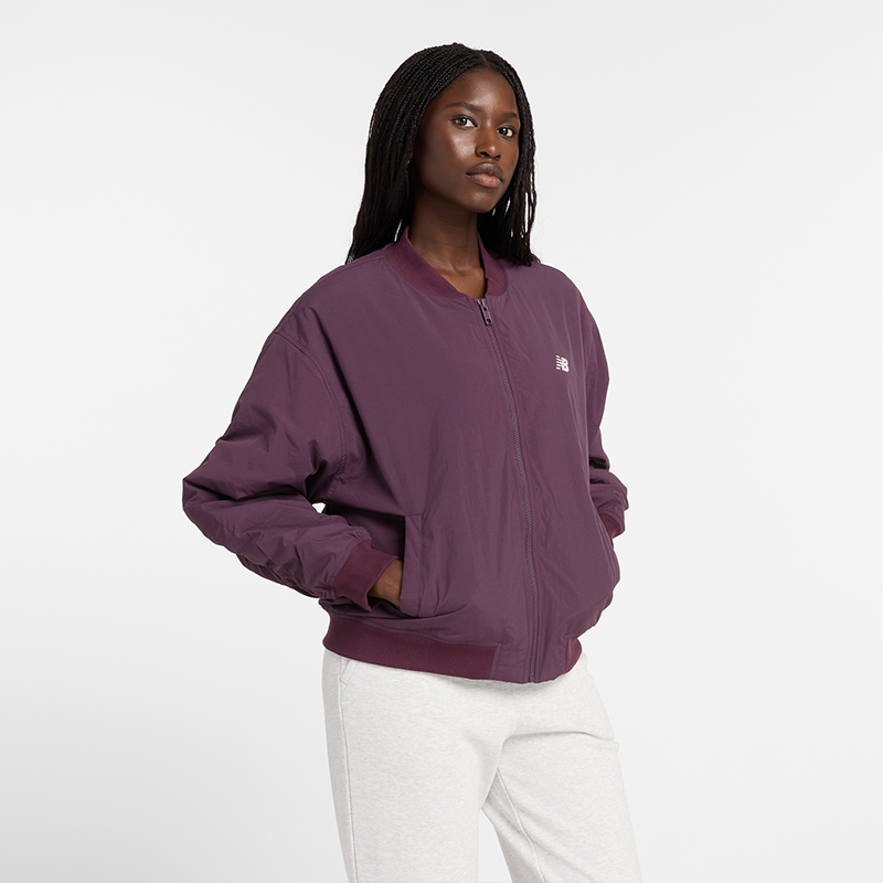 

Dámská bunda New Balance WJ43511PLN – fialové