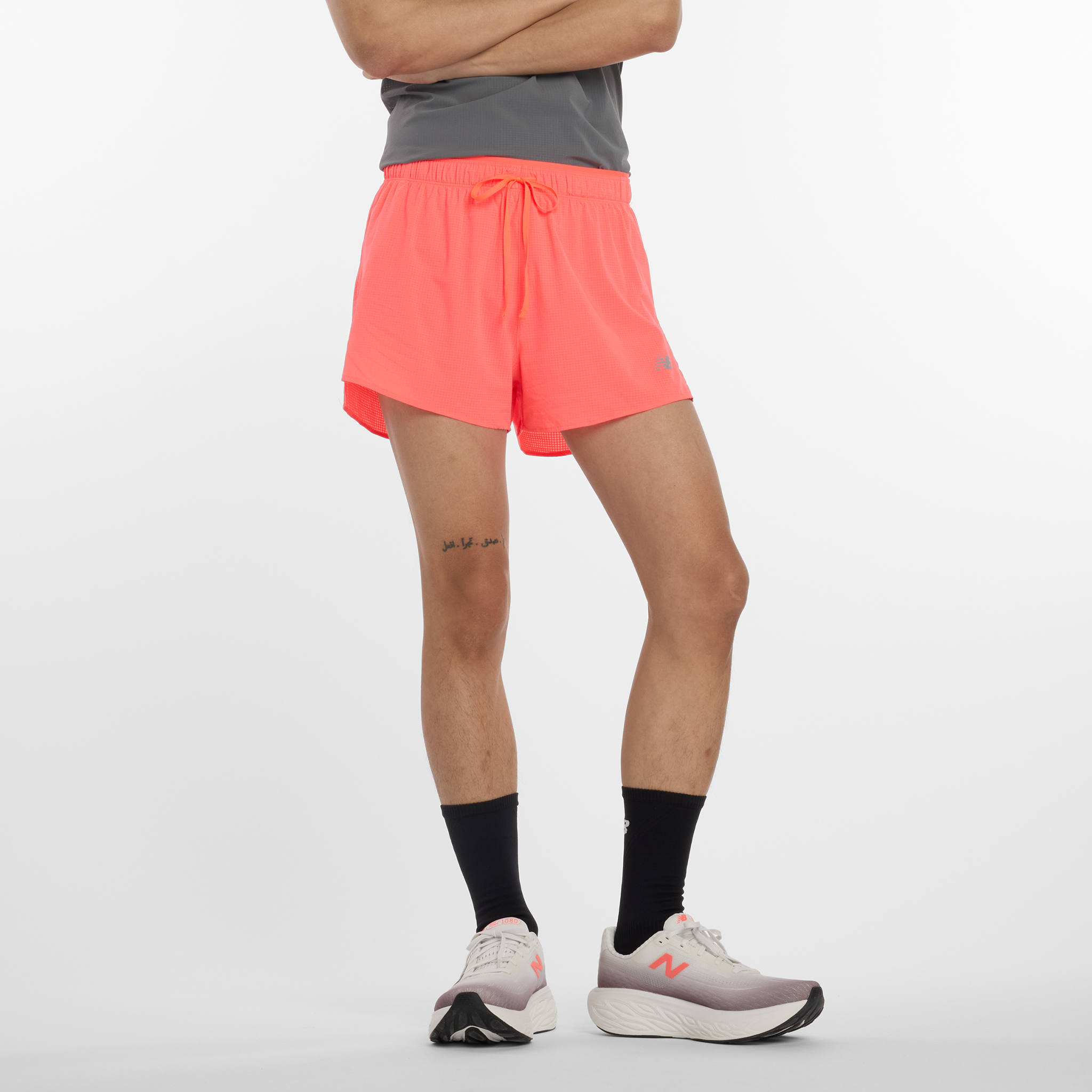 

Pánské šortky New Balance MS51283URR – oranžová
