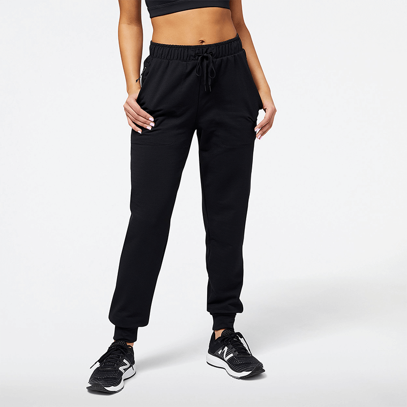 

Kalhoty New Balance WP23287BK – černé