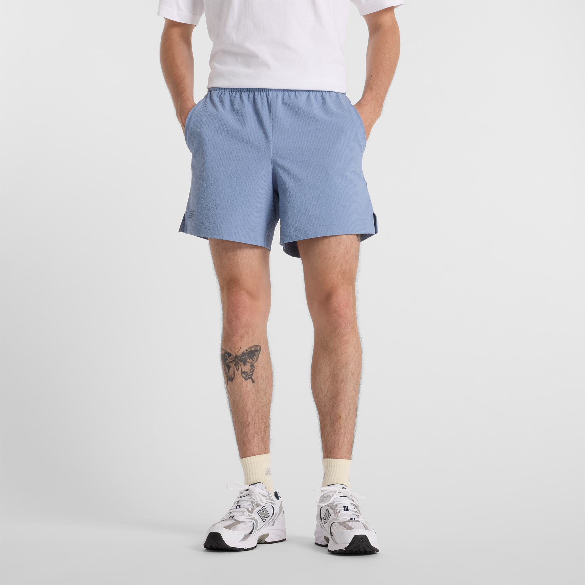 

Pánské šortky New Balance MS51402DUS – modré