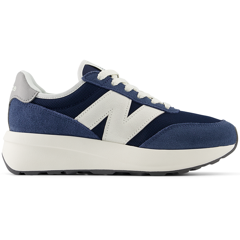 

Dětské boty New Balance GS370AG – tmavomodrá