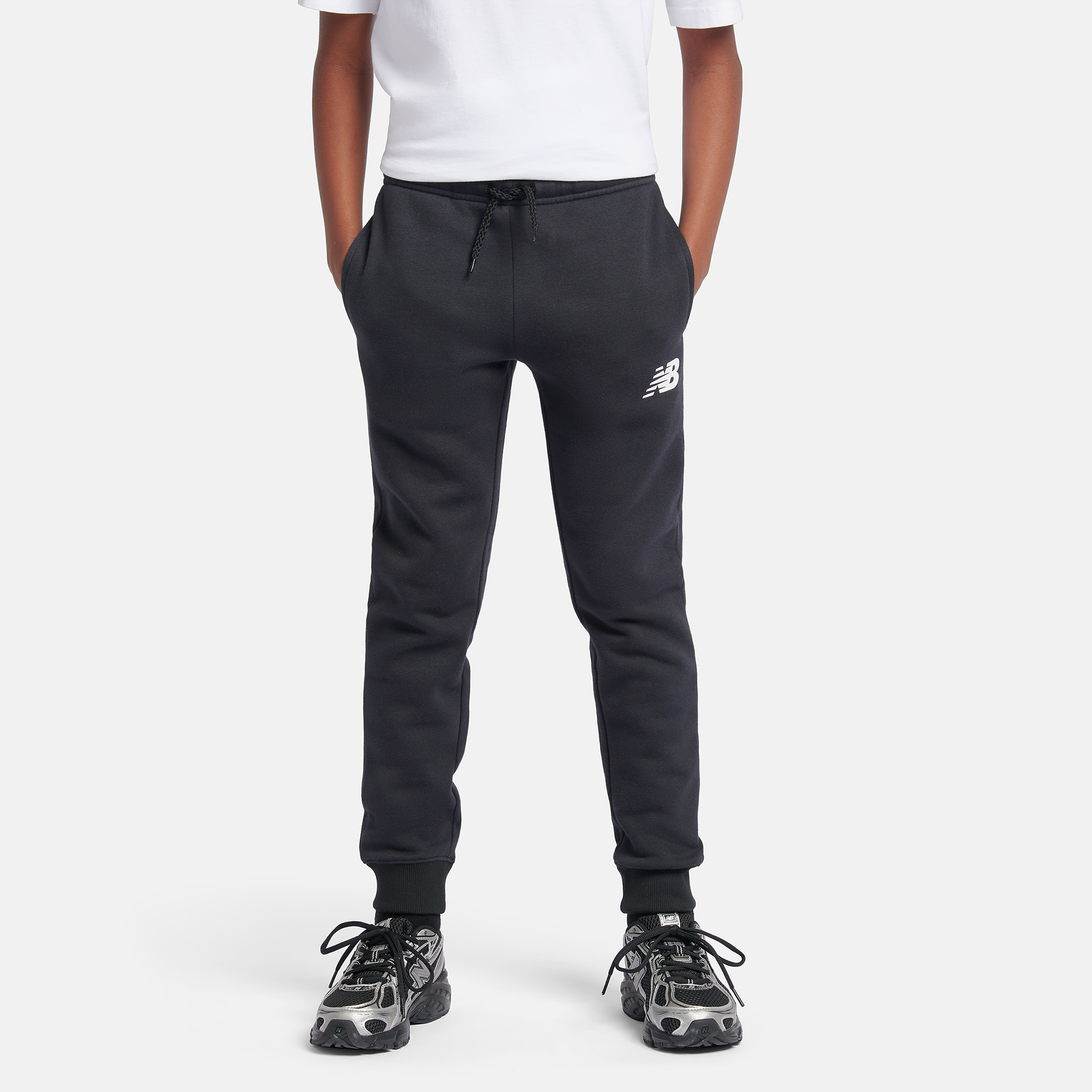 

Dětské kalhoty New Balance LAKB0007BK – černé