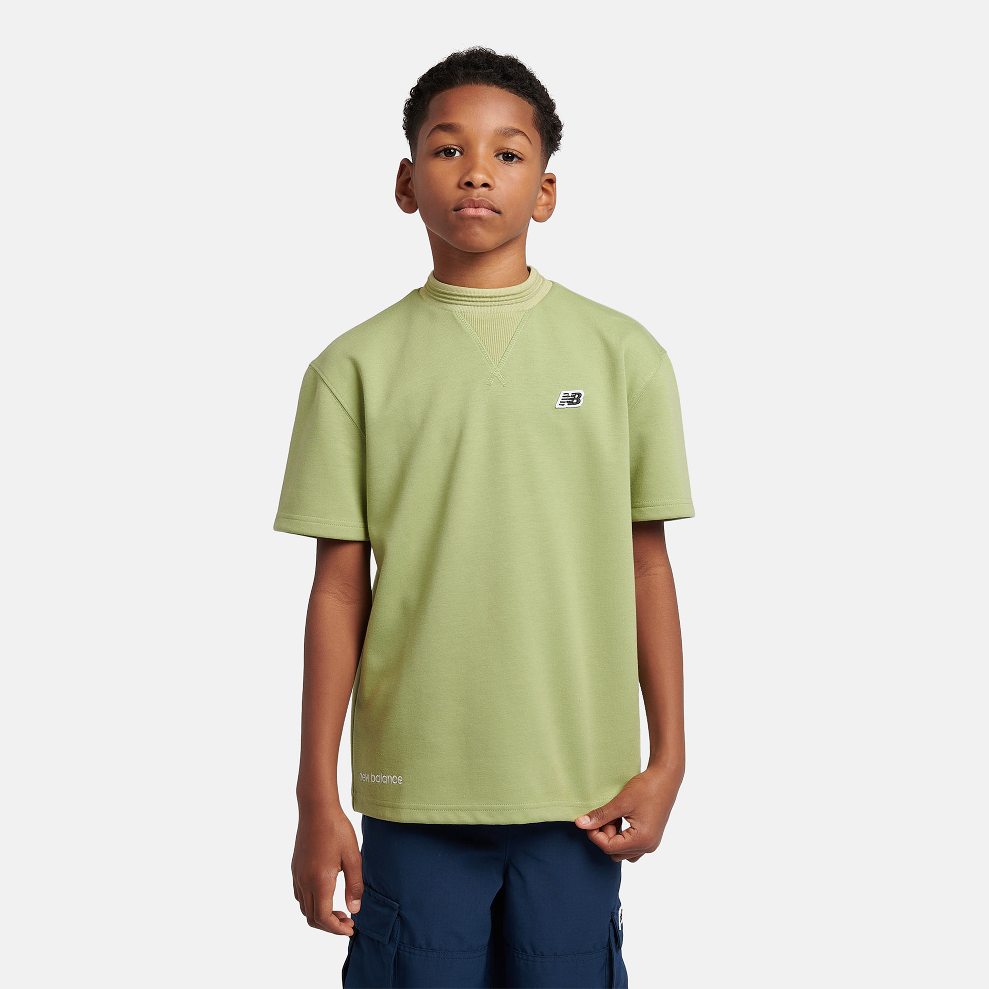 

Dětské tričko New Balance LAKB0191EEN – zelené