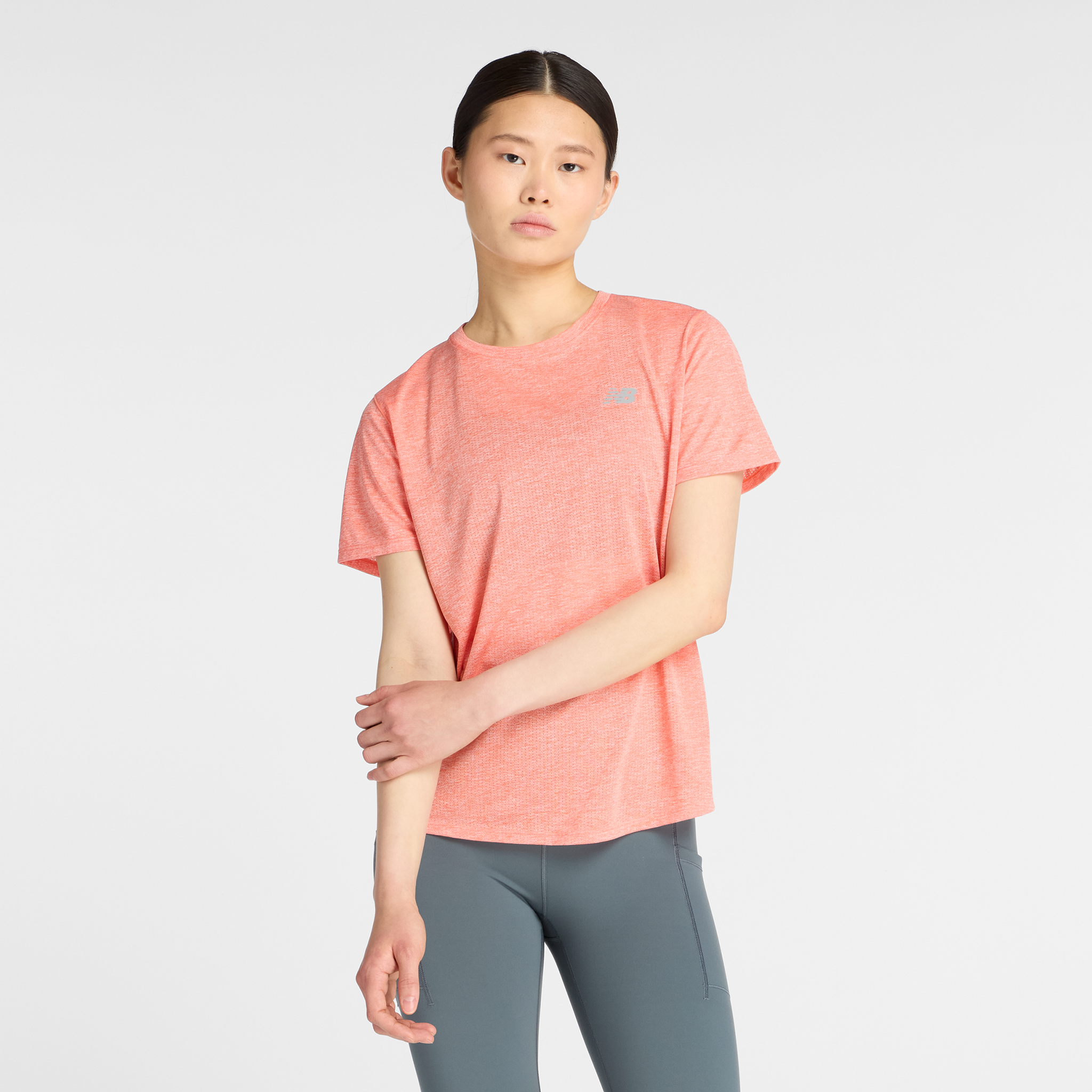 

Dámské tričko New Balance WT41253FLE – oranžová