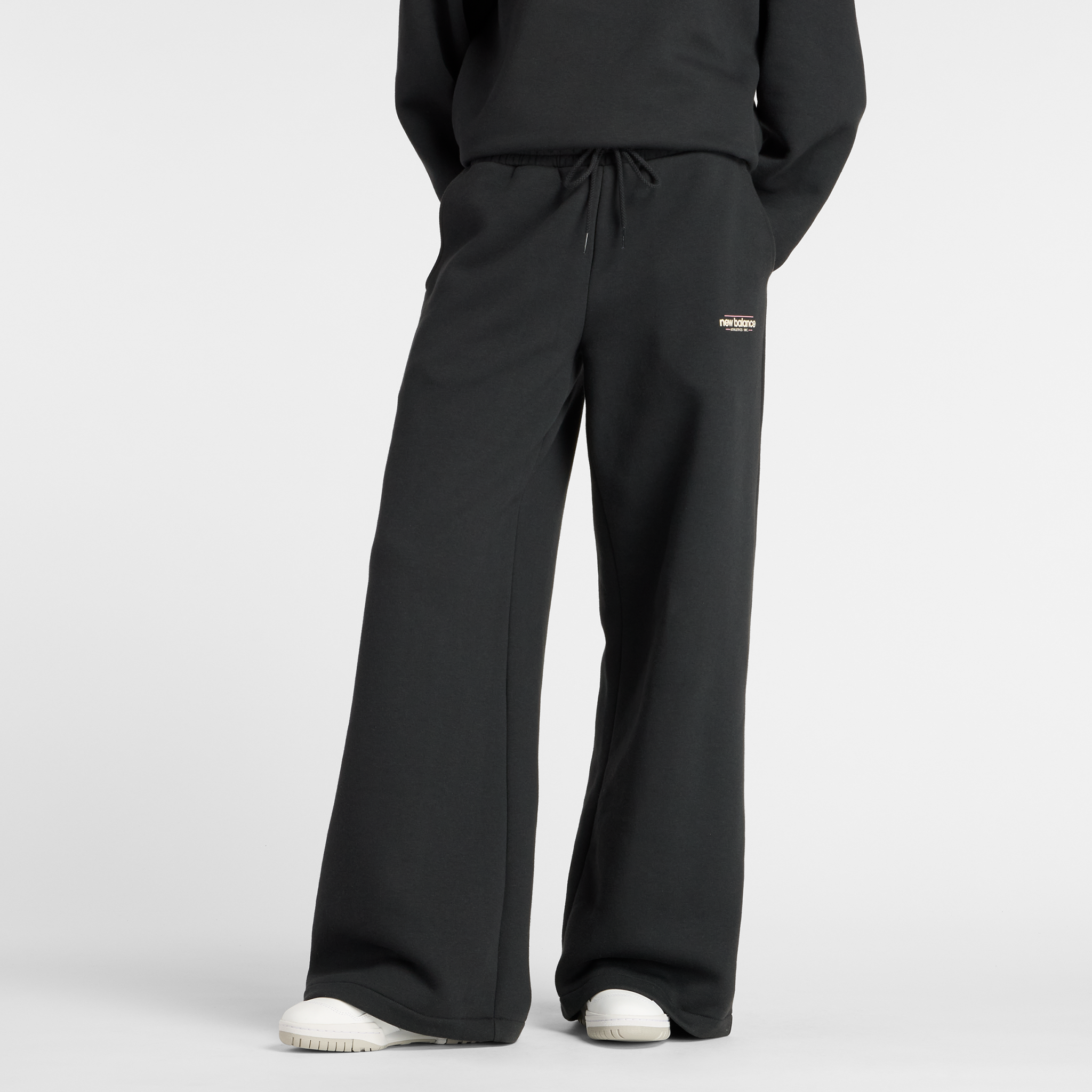 

Dámské kalhoty New Balance WP53903BK – černé