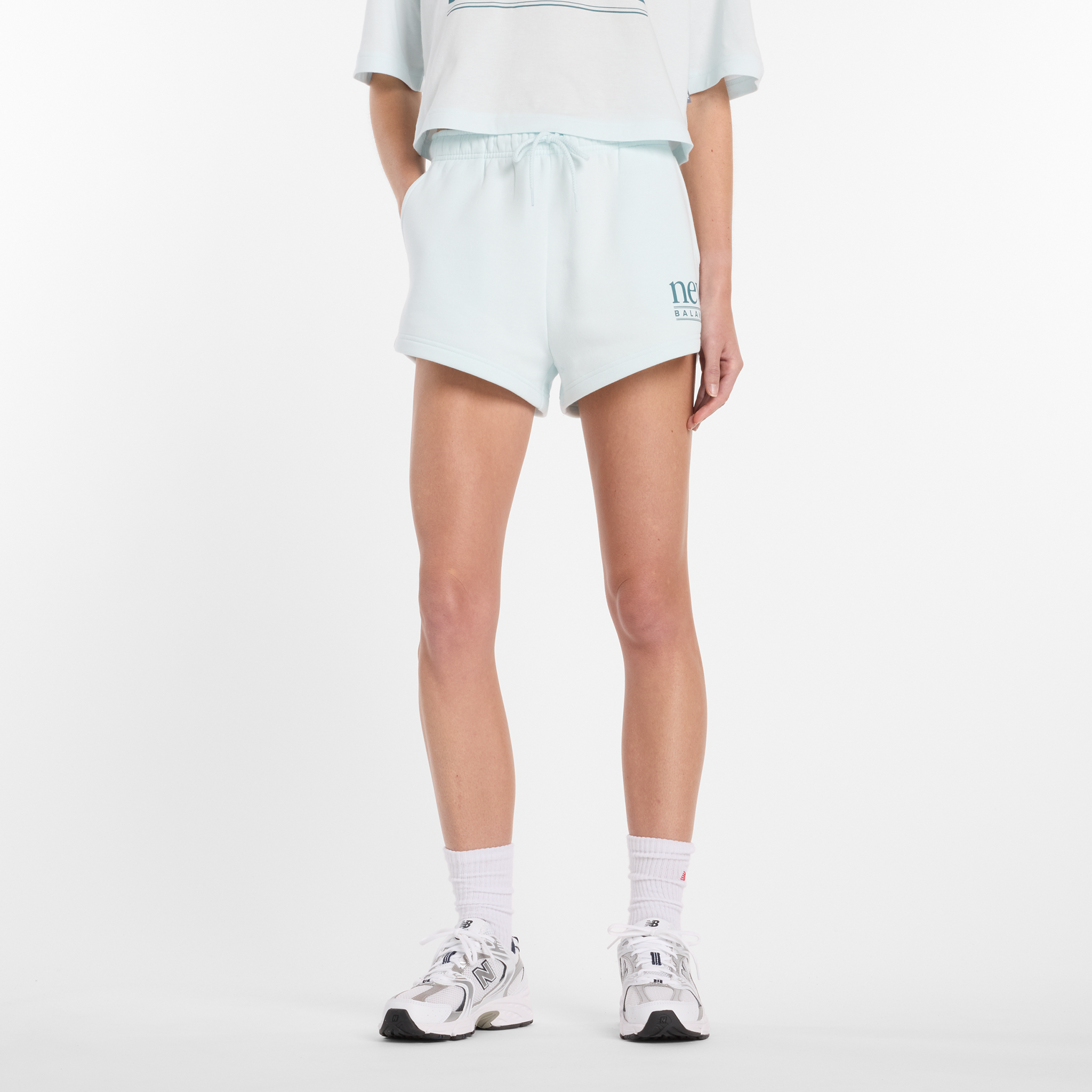 

Dámské šortky New Balance WB61Y80AAAW – mátové