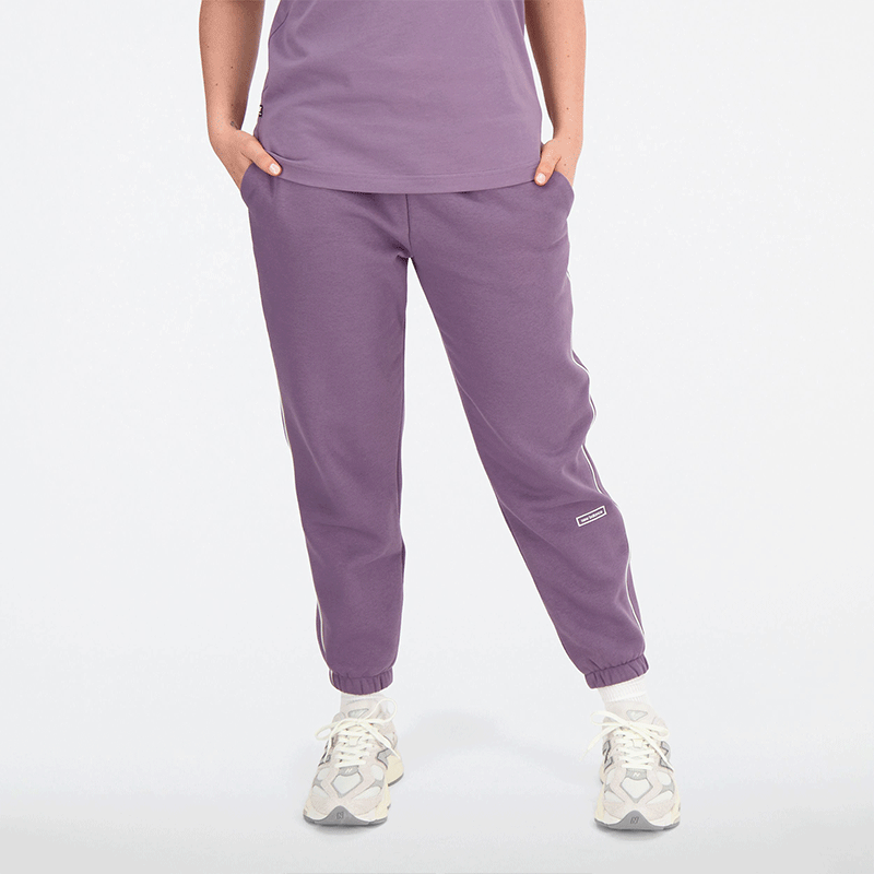 

Dámské kalhoty New Balance WP33509SHW – fialové