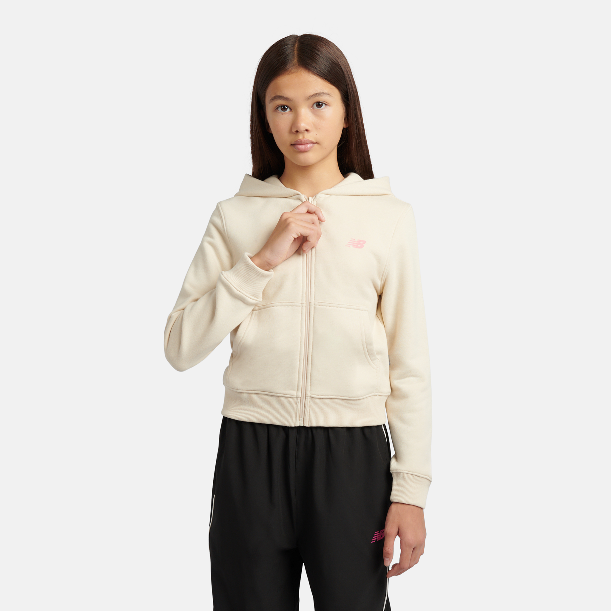 

Dětská mikina New Balance YT61P93CLIN – béžové