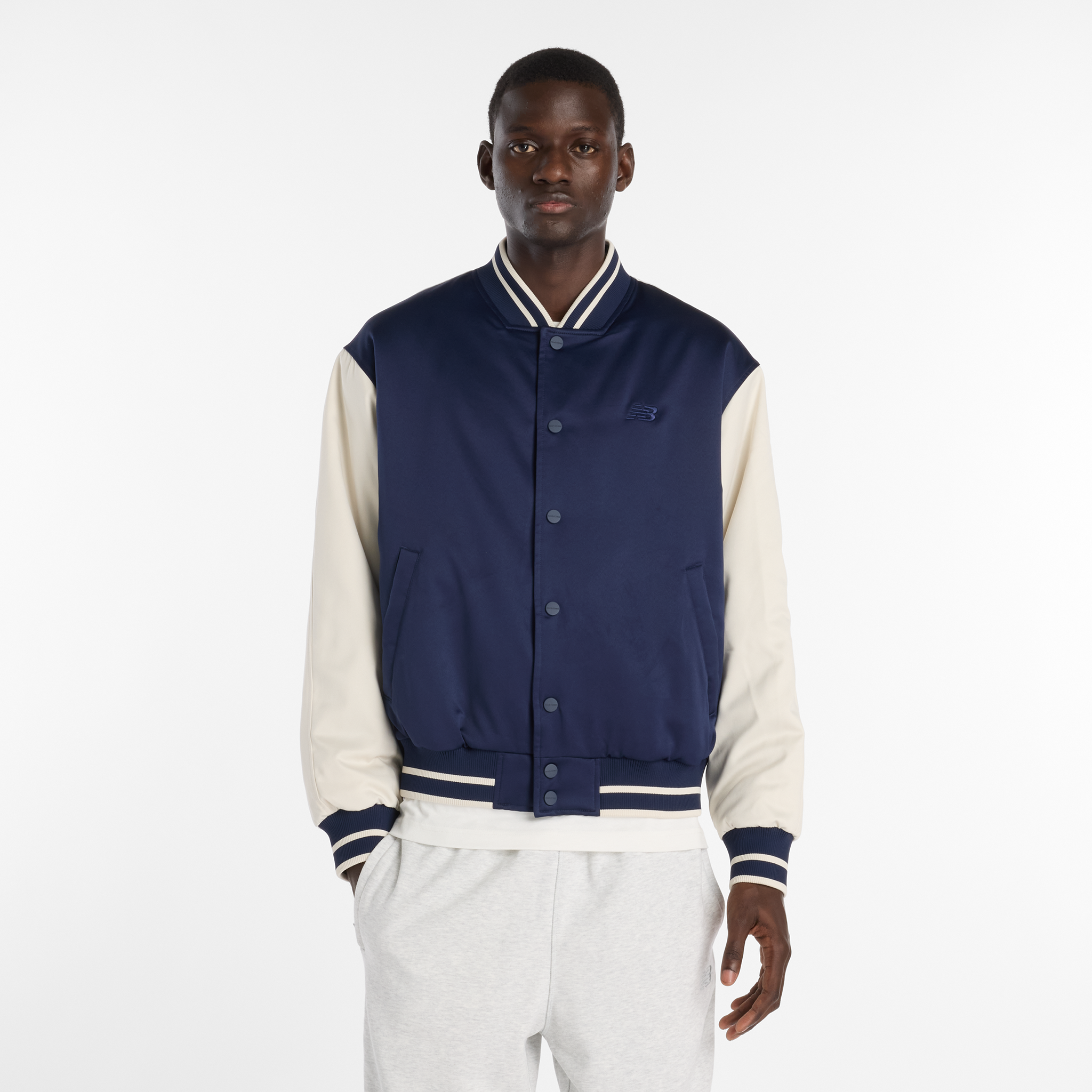 

Pánská bunda New Balance MJ6102R7TNV – tmavomodrá