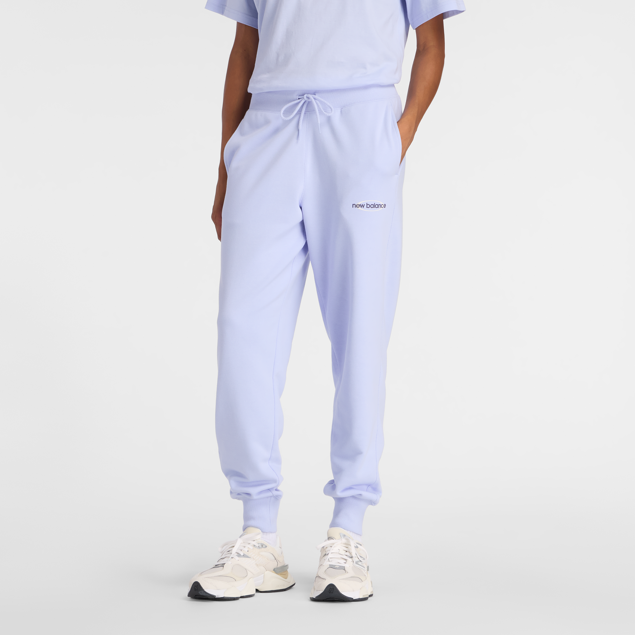 

Dámské kalhoty New Balance WB61D3EADYK – fialové