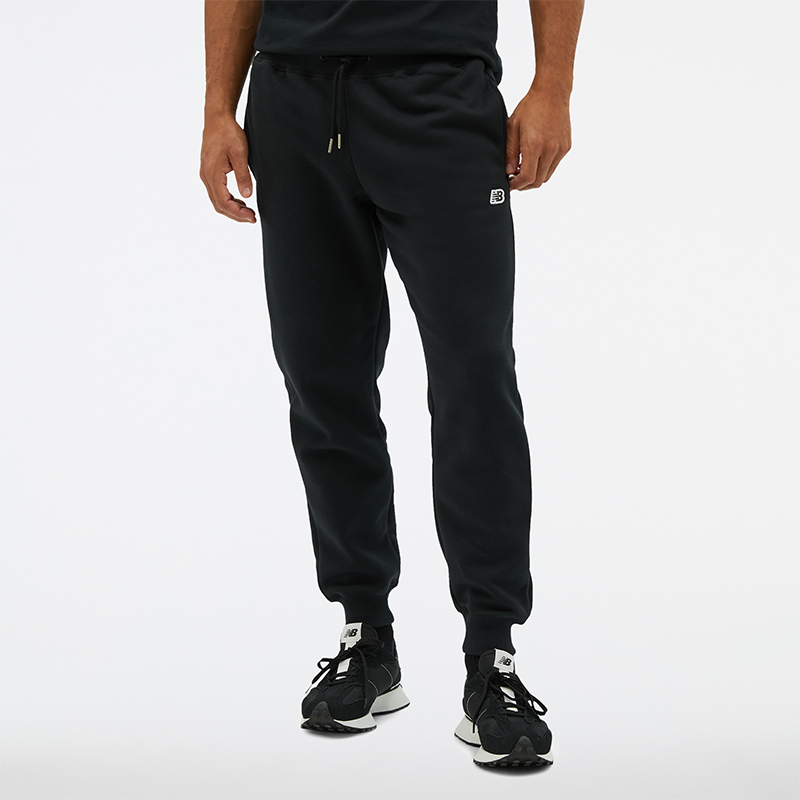 

Pánské kalhoty New Balance MP23600BK – černé