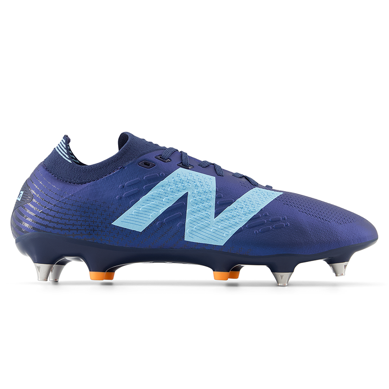 

Kopačky New Balance TEKELA PRO SG V4+ ST1SLN45 – tmavomodrá