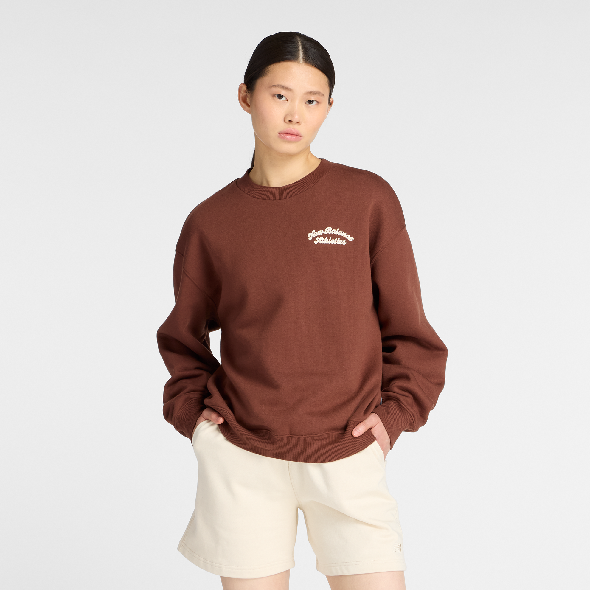 

Dámská mikina New Balance WT53516ROK – hnědý
