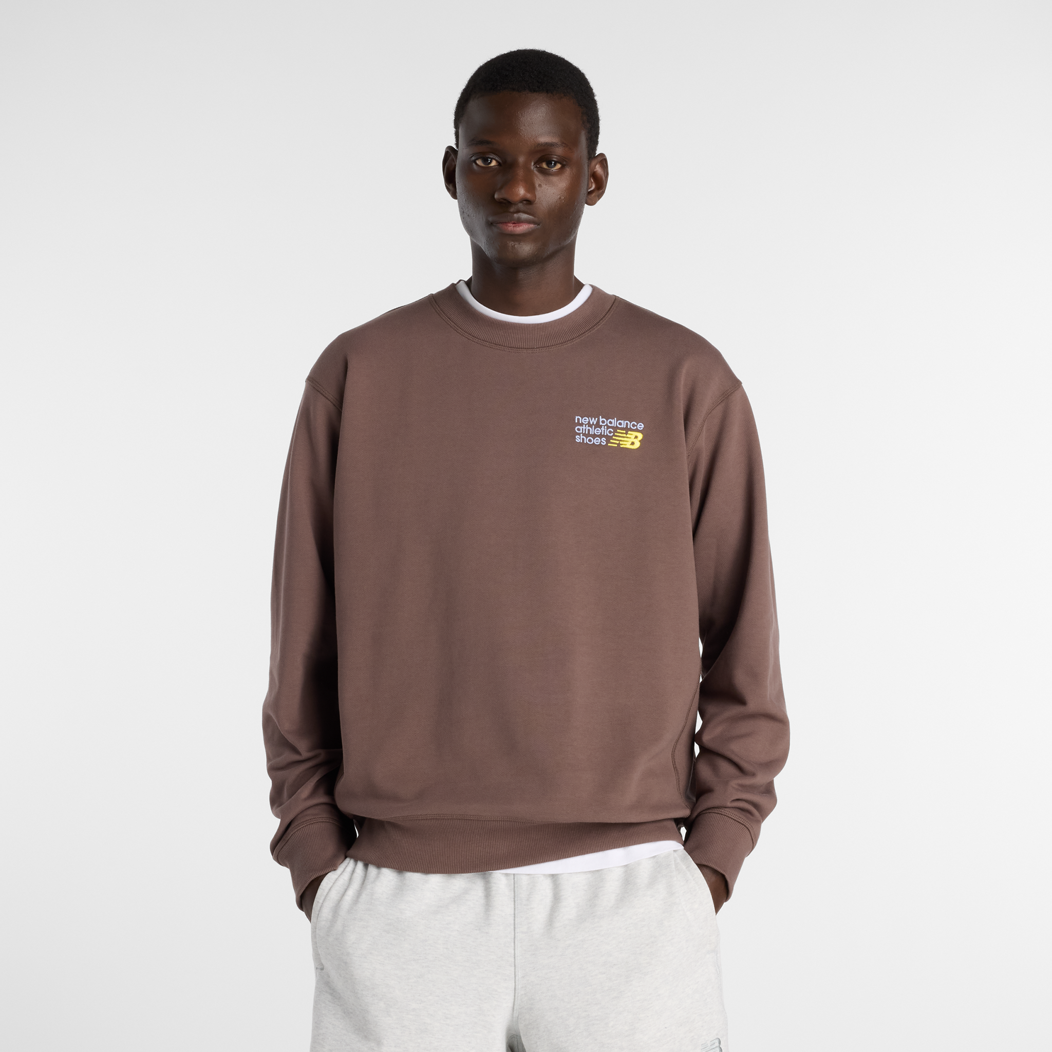 

Pánská mikina New Balance MT41547ABP – hnědý